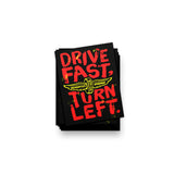 Drive Fast, Turn Left Mini Sticker