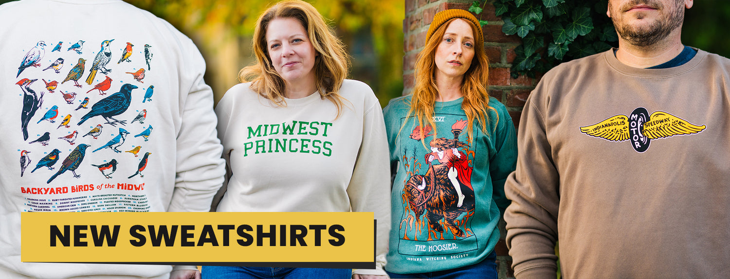 Four people wearing sweatshirts with various designs and text, with a 'NEW SWEATSHIRTS' banner.